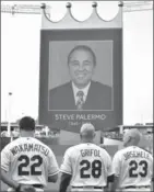  ?? JOHN SLEEZER, TNS ?? A moment of silence was observed forthe death ofmajor league umpire Steve Palermo before the Kansas City Royals-New York Yankees game Tuesday.