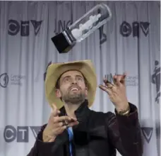  ?? JONATHAN HAYWARD/THE CANADIAN PRESS ?? Dean Brody, who won Country Album of the Year, was the only nominee in the category not from Alberta. He assured the crowd he’d lived in Calgary.