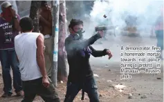  ?? — Reuters photo ?? A demonstrat­or fires a homemade mortar towards riot police during a protest in Managua.