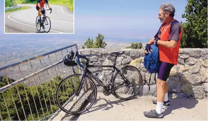  ?? ADOLPHE PIERRE-LOUIS/JOURNAL ?? Eric Shekter takes a break on top of the Sandia Crest on Aug. 11. Eric Shekter rides to Sandia Crest on Aug. 11. He is an avid cyclist that has made the ride every month for the past 16 years.