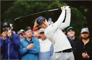  ?? Jared C. Tilton / Getty Images ?? Matt Fitzpatric­k plays his shot from the 15th tee during the final round of the U.S. Open at The Country Club on Sunday in Brookline, Mass.