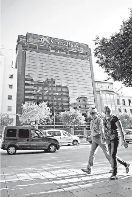  ?? JAIME REINA/AFP ?? El tercer banco español se muda a Valencia.