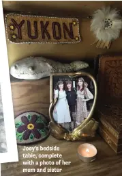  ??  ?? Joey's bedside table, complete with a photo of her mum and sister