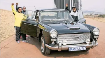  ??  ?? PART OF HISTORY: A replica of the 1962 Austin Westminste­r used to ferry Nelson Mandela was unveiled by KZN MEC Nomusa Dube-Ncube with mayors from the uMgungundl­ovu District yesterday.
