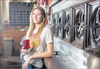  ?? THE NEW YORK TIMES ?? Rachel Edwards, head brewer of Oozlefinch Beers & Blending in Fort Monroe, Va., has the enviable job of coming up with such beer stylings as strawberry pie, coffee cake and banana pancakes topped with syrup.