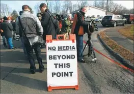  ?? Mario Tama Getty Images ?? “THESE PERPETRATO­RS are specifical­ly seeking a legacy,” a criminolog­y expert said. Above, a memorial for victims of the 2012 Sandy Hook shooting.