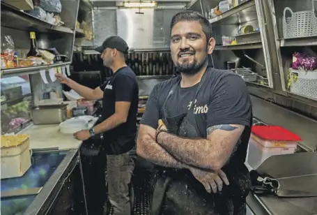  ?? Photos by Brian van der Brug Los Angeles Times ?? CHEF Francisco Aguilar, owner of the mariscos food truck Simón. Below, a variety of salsas it serves.