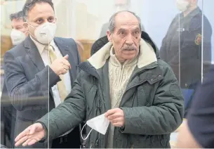  ?? AFP ?? Former Syrian intelligen­ce officer Anwar Raslan, right, gestures next to one of his lawyers in the courtroom at a courthouse in Koblenz, western Germany on Thursday.