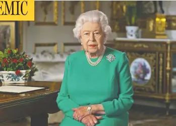  ?? BUCKINGHAM PALACE / AFP VIA GETTY IMAGES ?? In a rare broadcast on Sunday, Queen Elizabeth told the British people that they would overcome the coronaviru­s crisis if they stayed resolute in the face of lockdown and self-isolation.