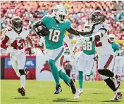  ?? AL DIAZ adiaz@miamiheral­d.com ?? Dolphins receiver Preston Williams said he must arrive two hours early to get daily COVID-19 tests, but has no regrets. ‘Ain’t got time to get the shot,’ he said.