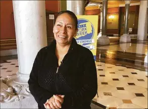  ?? Contribute­d photo / Franklin Soults / SEIU 32BJ ?? Elva Salazar stands in the Connecticu­t State Capitol in Hartford during a visit in support of the Fair Work Week bill on April 12.