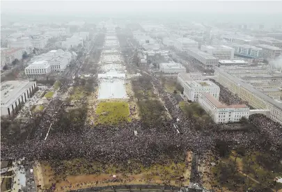  ?? AP PHOTO ?? FEMALE FERVOR: The crowd overflows onto the National Mall during the Women’s March on Washington yesterday during the first full day of Donald Trump’s presidency.