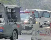  ??  ?? Police commandos escort vehicles carrying the Sri Lankan cricket team as they arrive at the Rawalpindi stadium for the first Test. AP