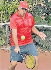  ?? Picture: IVOR MARKMAN ?? WINNING TOUCH: Helgard Zietsman plays a backhand on his way to another Wembley Men’s Doubles tennis title after partnering Chris Loock to victory in the final at the PE Lawn Tennis Club at the weekend