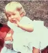  ??  ?? Lady Diana Spencer at a year old, above, and below, on holiday in 1971