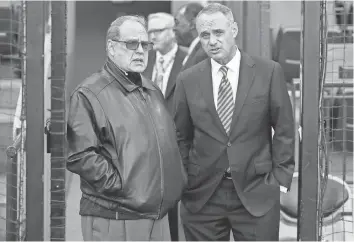  ?? KAMIL KRZACZYNSK­I, USA TODAY SPORTS ?? White Sox owner Jerry Reinsdorf, 81, left, with Commission­er Rob Manfred, says he must focus on “what’s right for the fans and not even think about how old I am.”