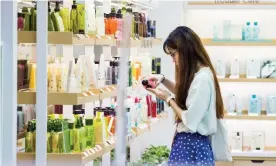  ??  ?? So much to choose from. K-beauty brands are part of a new wave of lower-cost beauty products. Photograph: Bloomberg via Getty Images