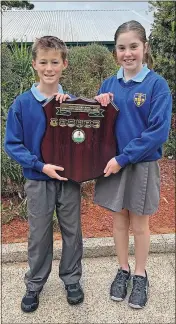  ?? ?? Right: Senior Boys individual age champion Riley Thompson and fellow School Captain, Ava East, celebrate TPS winning the PSSA Finley Zone Athletics carnival last week.