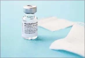  ?? Jessica Hill / Associated Press file photo ?? The Pfizer-BioNTech vaccine for COVID-19.