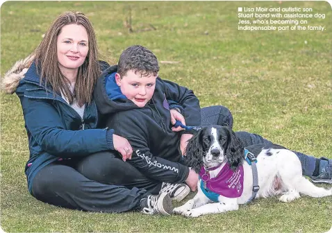  ??  ?? Lisa Moir and autistic son Stuart bond with assistance dog Jess, who’s becoming an indispensa­ble part of the family.
