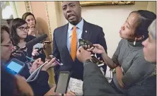  ?? J. SCOTT APPLEWHITE/AP FILE PHOTO ?? Sen. Tim Scott, R-S.C., the only African-American Republican serving in the Senate, talks to reporters in Washington in 2017.