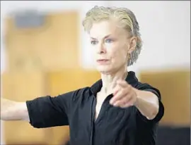  ?? Carolyn Cole Los Angeles Times ?? LUCINDA CHILDS works with the dancers for the updated production.