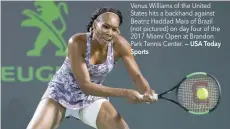  ?? Sports — USA Today ?? Venus Williams of the United States hits a backhand against Beatriz Haddad Maia of Brazil (not pictured) on day four of the 2017 Miami Open at Brandon Park Tennis Center.