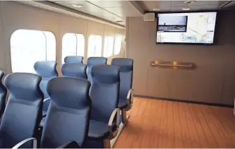  ?? RICK WOOD / MILWAUKEE JOURNAL SENTINEL ?? The interior of The Lake Express ferry has added a web cam on its monitor showing the forward motion of the ship. The ferry launched spring service on April 28. The Lake Express crosses Lake Michigan four times a day.