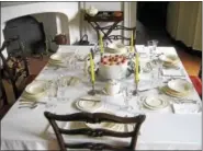  ??  ?? The dining room at Pottsgrove Manor evokes the elegance of the era.
