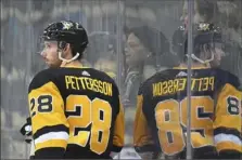  ?? Peter Diana/Post-Gazette photos ?? Marcus Pettersson has grown into one of the Penguins most reliable defensemen since being acquired Dec. 3.