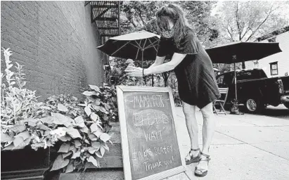  ?? KATHY WILLENS/AP ?? Samantha DiStefano, owner of Mama Fox in New York, plans to rely heavily on outdoor dining even as the weather gets cooler.
