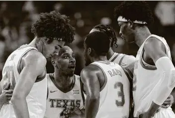  ?? Chris Covatta / Getty Images ?? Coach Shaka Smart said the Longhorns have moved on from Sunday’s bench-area scuffle between Courtney Ramey (3) and Andrew Jones. Ramey said it’s “in the past” as UT prepares to host Kansas on Tuesday.
