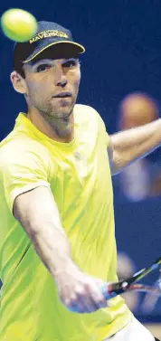  ?? AFP ?? Croatia’s Ivo Karlovic of Philippine Mavericks hits a return against Croatia’s Marin Cilic of UAE Royals during their men’s singles at the IPTL.