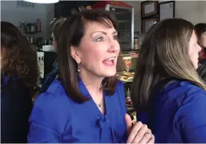  ?? Sara Burnett, AP) (Photo by ?? In this Feb. 13, 2018 photo Democratic candidate for the 3rd congressio­nal district Marie Newman speaks with supporters at a campaign event in LaGrange, Ill. Newman is a political newcomer challengin­g US Rep. Dan Lipinski in the March 20 primary.