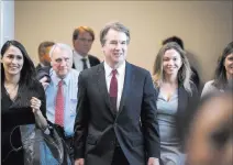  ?? Tom Williams ?? The Associated Press Supreme Court nominee Brett Kavanaugh on his way to a meeting with Sen. Dean Heller, R-nev., on Thursday in Washington.