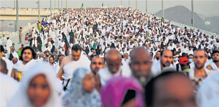  ??  ?? Hundreds of thousands of Muslim pilgrims make their way to a ceremony symbolisin­g the stoning of Satan, the last rite of the annual Hajj. The Saudi authoritie­s were ill-prepared for the vast number of people who attended, said witnesses