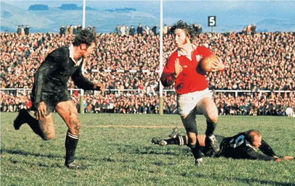  ??  ?? Lionhearts: JPR Williams runs the All Blacks ragged during a 1971 Test, and (right) lock Willie John McBride
Ray McLoughlin