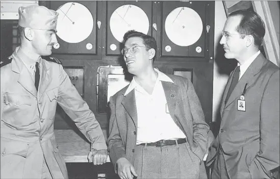  ?? From John Seltzer and Geo Rule ?? SCIENCE FICTION writers whose work helped shape the Golden Age were L. Sprague de Camp, left, Isaac Asimov and Robert A. Heinlein, together in 1944.