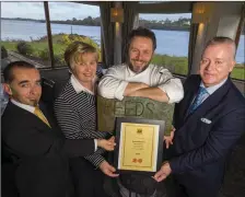  ??  ?? Rom Daniel, Maitre D; Janette O’Keeffe, Assistant General Manager at the Ferrycarri­g Hotel, Tony Carty, Head Chef; and Derek Coyne, General Manager.