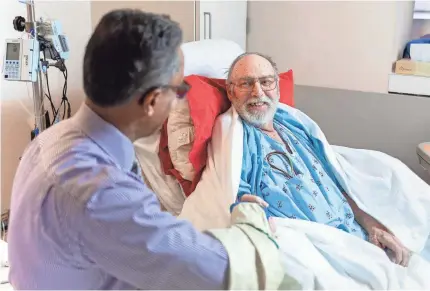  ?? MICHAEL J. CLEARY/MAYO CLINIC ?? Dr. Sudhir Kushwaha, Chuck Newman’s transplant cardiologi­st, is coordinati­ng Newman’s care with his two surgeons. Newman expects to be home to his horse farm in Glidden, Iowa, for the holidays.