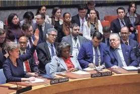  ?? ?? U.S. Ambassador to the United Nations Linda Thomas-Greenfield, center, said the U.S. abstained from the vote for an immediate cease-fire in Gaza because it did not agree with everything in the resolution and the text did not include a condemnati­on of Hamas.