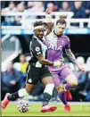  ?? ?? Newcastle’s Allan Saint-Maximin (left), is challenged by Tottenham’s Pierre-Emile Hojbjerg during an English Premier League soccer match between Newcastle and Tottenham Hotspur at St. James’ Park in Newcastle, England. (AP)