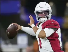  ?? AP PHOTO/MARCIO JOSE SANCHEZ, FILE ?? FILE - Arizona Cardinals quarterbac­k Kyler Murray (1) passes against the Los Angeles Rams during the second half of an NFL wild-card playoff football game in Inglewood, Calif., Monday, Jan. 17, 2022. Kyler Murray has agreed to a long-term contract that will keep the quarterbac­k with the Arizona Cardinals through the 2028season.