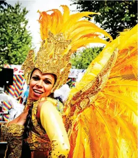  ??  ?? Plumage: Feathery carnival costumes come from all over