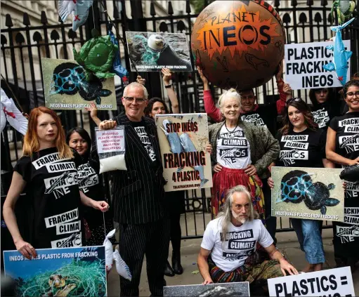  ?? ?? Above: British fashion designer Dame Vivienne Westwood and her son Joe Corre stage an anti-fracking protest outside Downing Street in 2018; Malcolm McLaren with Westwood outside Bow Street Magistrate­s Court, after being remanded on bail for fighting; the original line up of the Sex Pistols