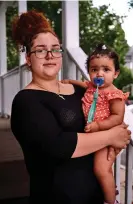  ?? ?? Elena and daughter Kaihlani Bautista outside of the old residence with lead pipes