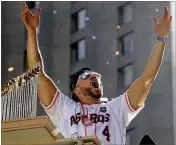  ?? GODOFREDO A. VASQUEZ / HOUSTON CHRONICLE ?? Houston Astros outfifield­er George Springer, the World Series MVP, celebrates during a parade honoring the champions.
