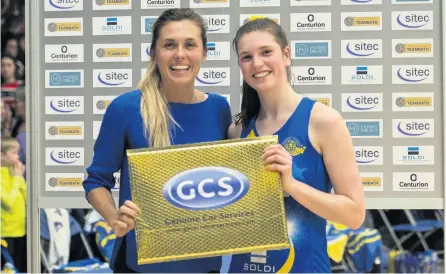  ??  ?? Genuine Car Services Player of the Match Sophie Drakeford-lewis receives her prize from Lois Rideout after their victory over Manchester Thunder