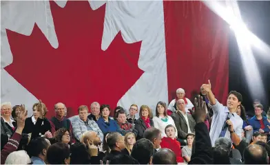  ?? CLIFFORD SKARSTEDT /PETERBOROU­GH EXAMINER / POSTMEDIA NEWS ?? Prime Minister Justin Trudeau addresses a crowd during a town hall meeting in Peterborou­gh, Ont., on Friday.