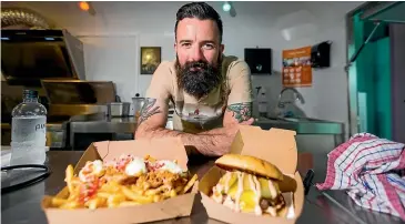  ?? PHOTOS: SIMON O’CONNOR/STUFF ?? Jonny Marinovich used to be head chef at Governor’s. Now he’s flipping burgers out of a food truck.